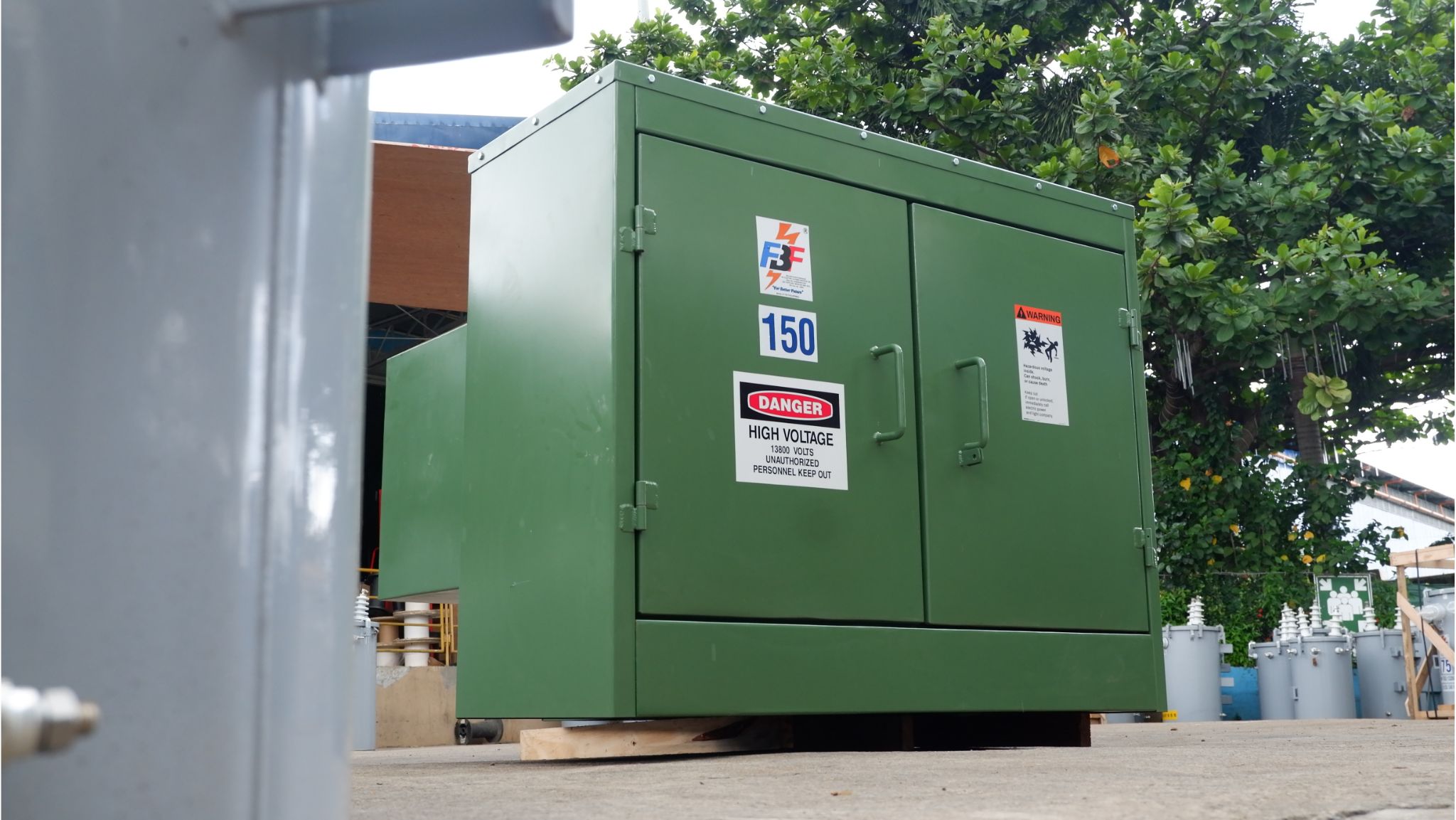 Pad mounted transformer on ground