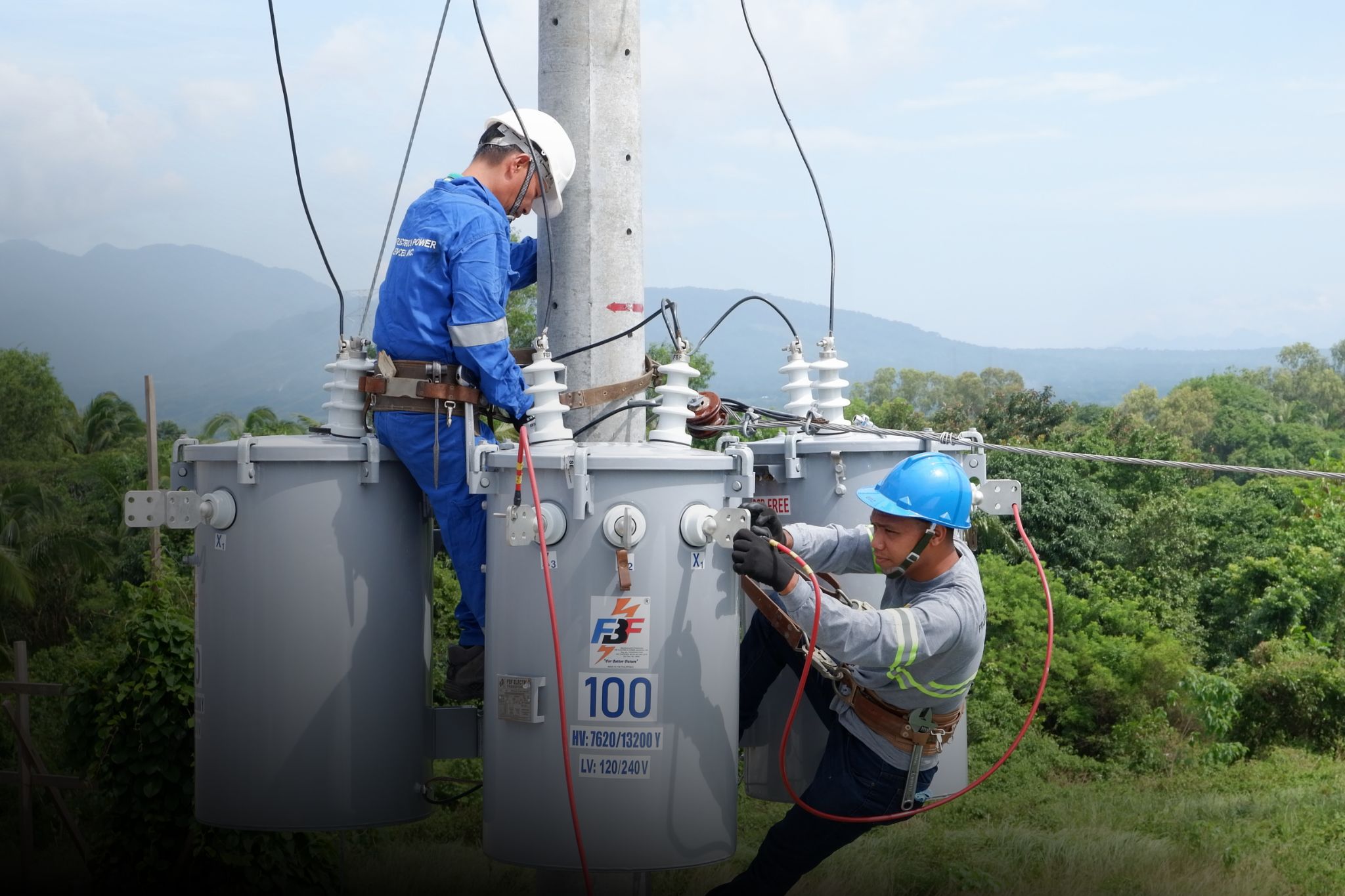 Man repairing transformer